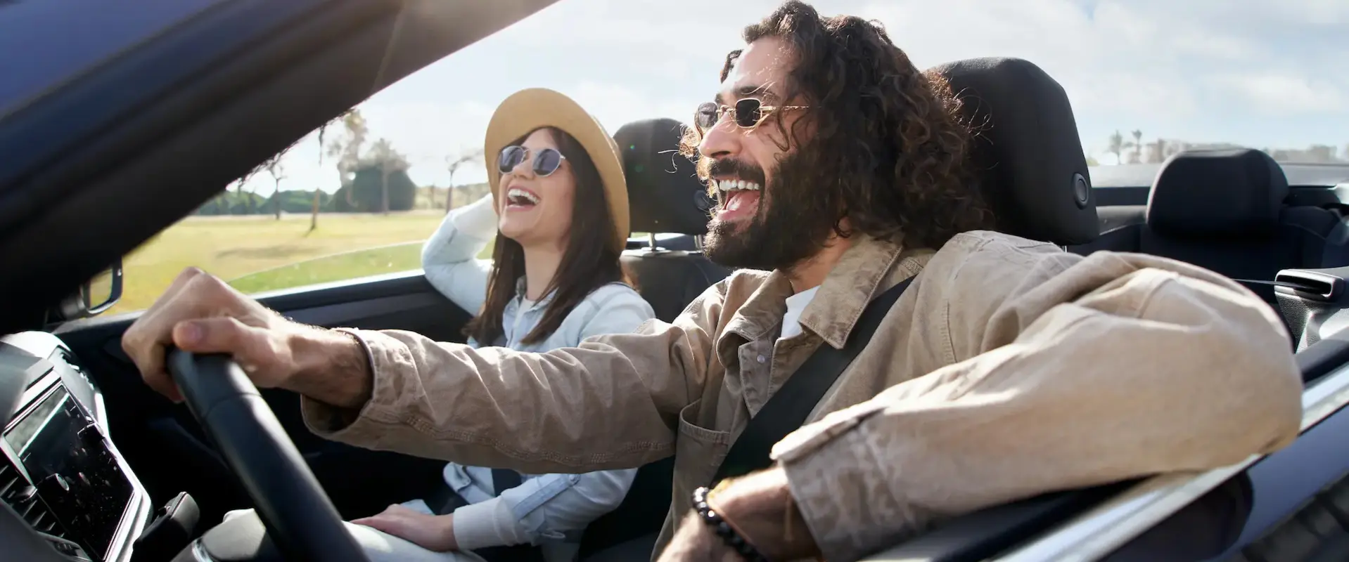 First Time Buyers driving off in their new vehicle